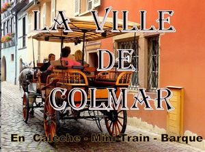 la_ville_de_colmar_en_alsace_en_caleche_mini_train_ou_barque_roland